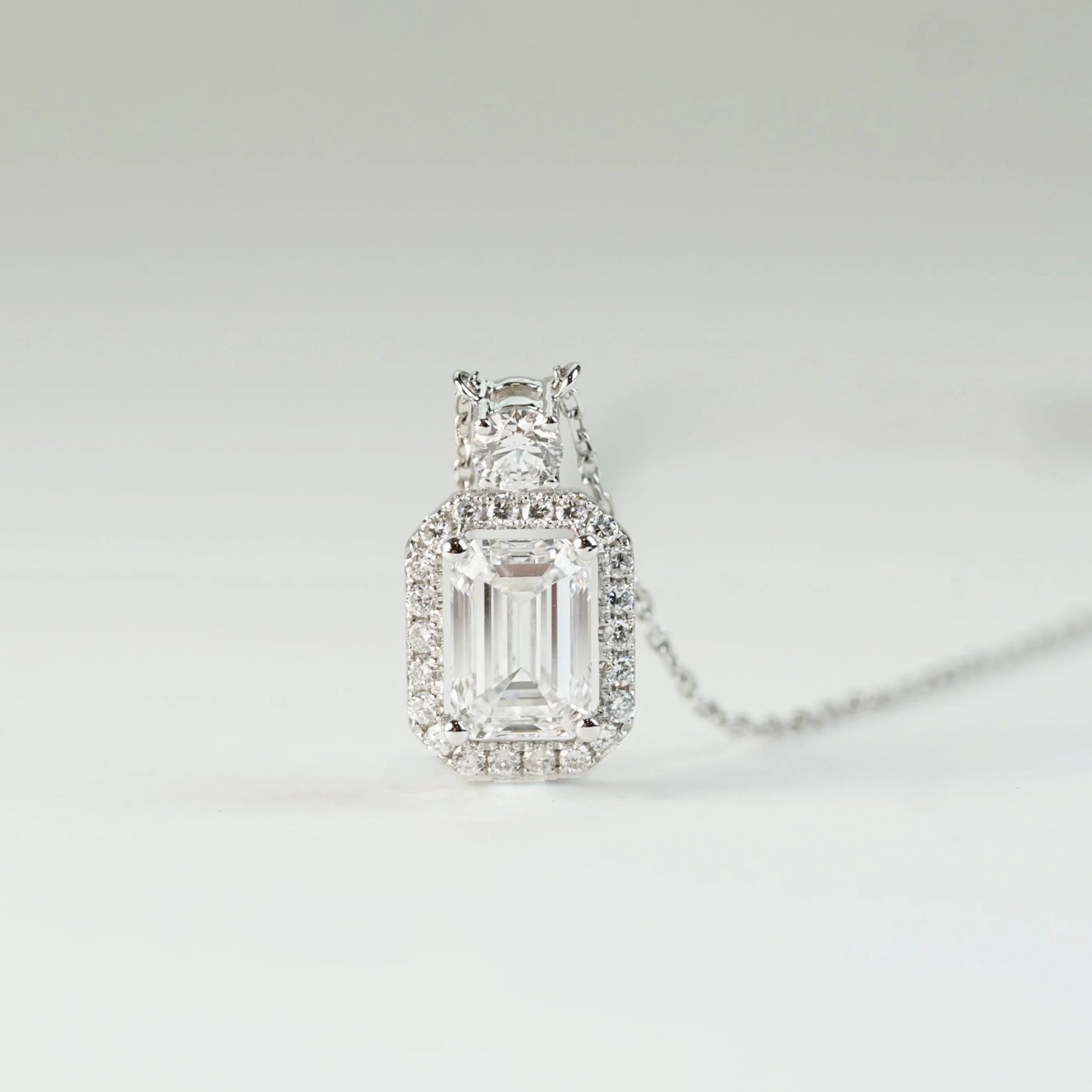 18K Gold Emerald-Cut Lab-Grown Diamond Halo Pendant | Pavé Circle Design | TMPE0101